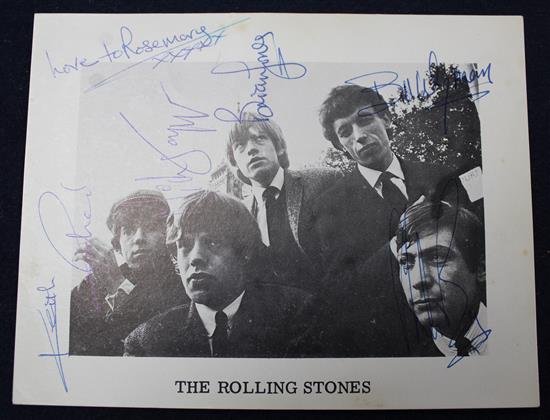 The Rolling Stones: A signed vintage postcard photograph signed by all five members of the band,